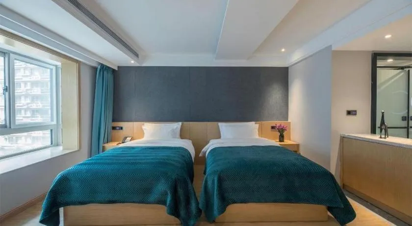 Bed in Xian Katie Eastman Hotel