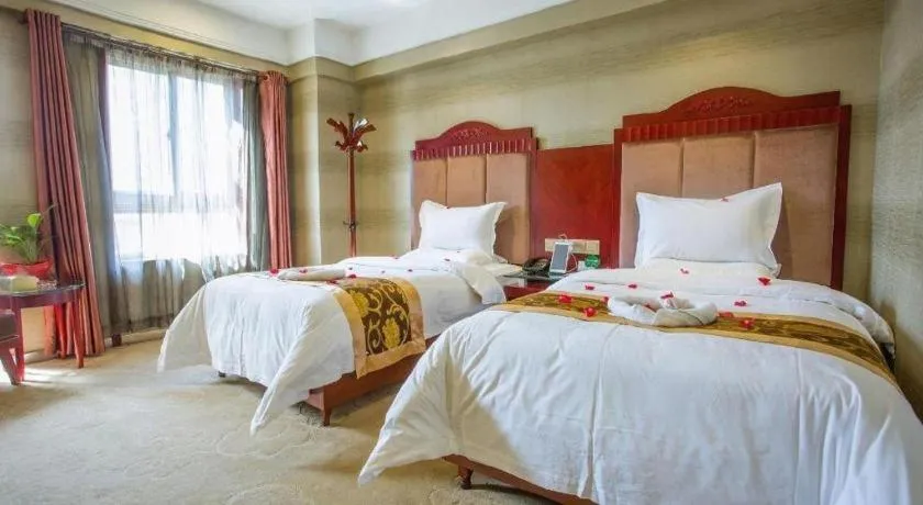 Bed in Xian Katie Eastman Hotel