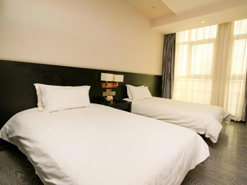 Bed in Xian I-OPAL Hotel