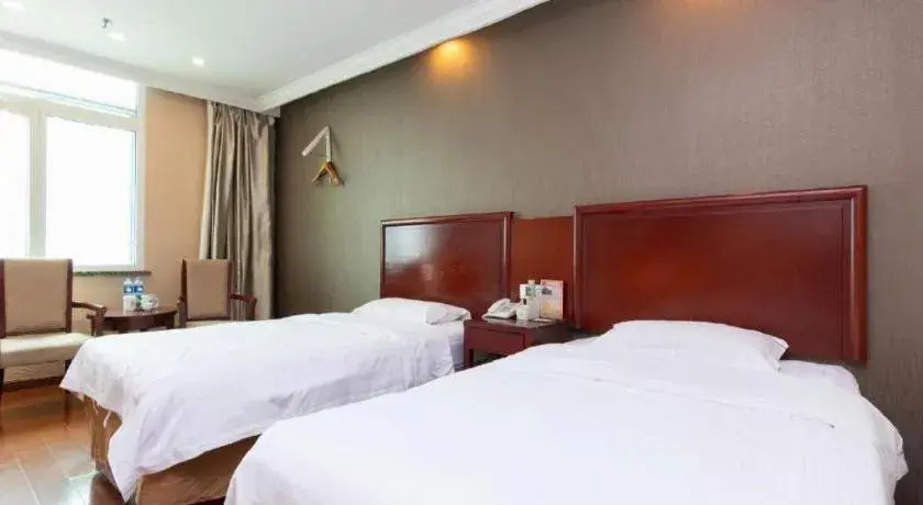 Bed in GreenTree Inn Shanghai Songjiang Xinqiao Jiuxin Road Express Hotel Bed in GreenTree Inn Shanghai Songjiang Xinqiao Jiuxin Road Express Hotel