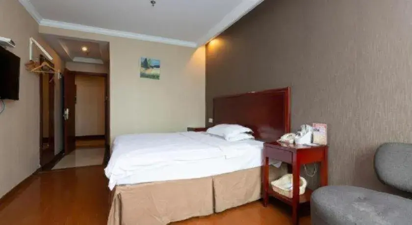 Bed in GreenTree Inn Shanghai Songjiang Xinqiao Jiuxin Road Express Hotel Bed in GreenTree Inn Shanghai Songjiang Xinqiao Jiuxin Road Express Hotel
