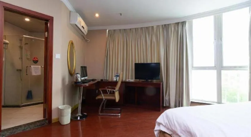 Bed in GreenTree Inn Shanghai Songjiang Xinqiao Jiuxin Road Express Hotel