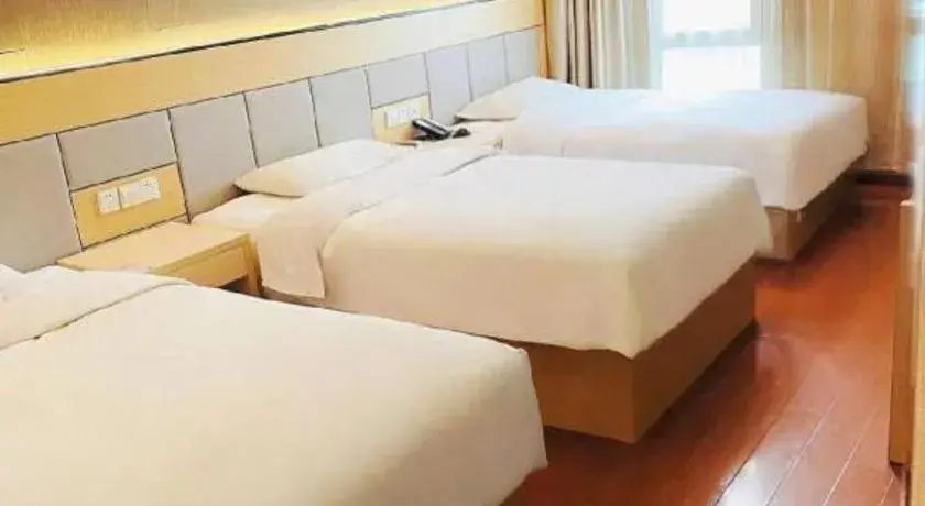 Bed in GreenTree Inn Shanghai Songjiang Xinqiao Jiuxin Road Express Hotel Bed in GreenTree Inn Shanghai Songjiang Xinqiao Jiuxin Road Express Hotel
