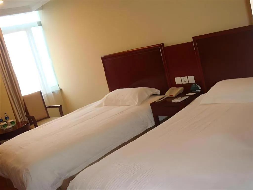 Bed in GreenTree Inn Shanghai Songjiang Xinqiao Jiuxin Road Express Hotel