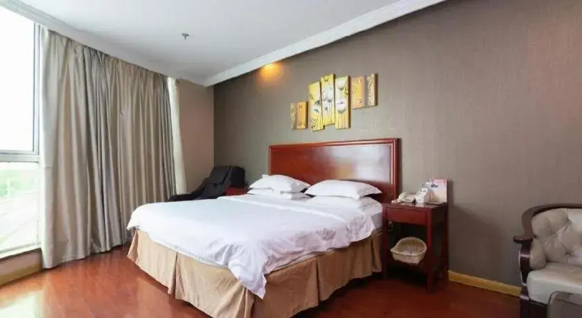 Bed in GreenTree Inn Shanghai Songjiang Xinqiao Jiuxin Road Express Hotel Bed in GreenTree Inn Shanghai Songjiang Xinqiao Jiuxin Road Express Hotel