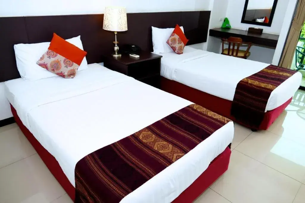 Bed in Baan Nan Hotel Bed in Baan Nan Hotel