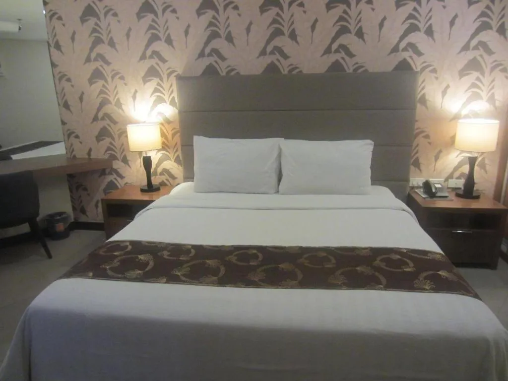Bed in GT Hotel Bacolod