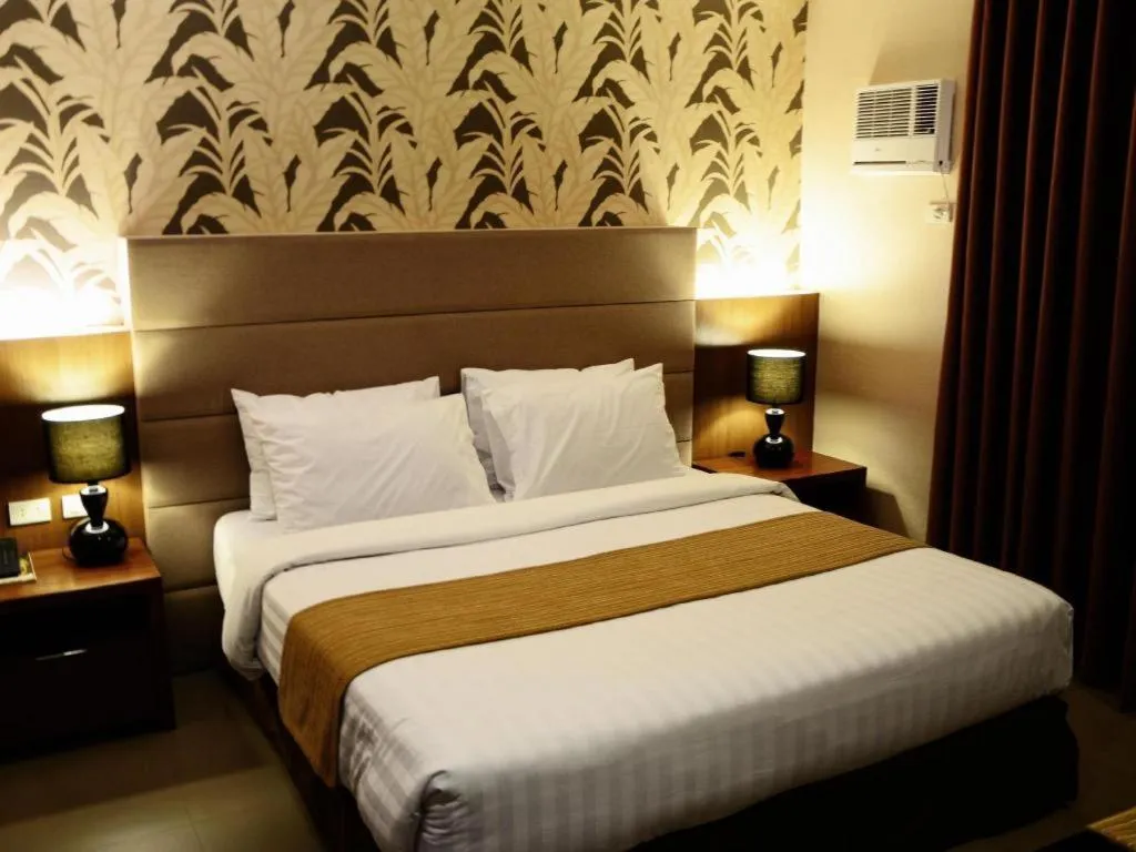 Bed in GT Hotel Bacolod