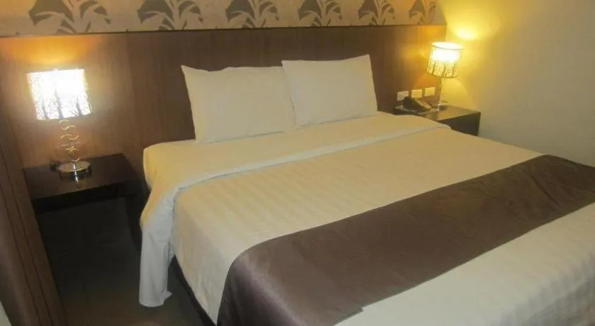 Bed in GT Hotel Bacolod