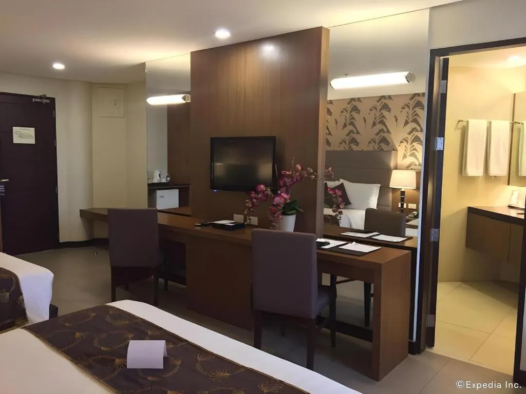 Bed in GT Hotel Bacolod