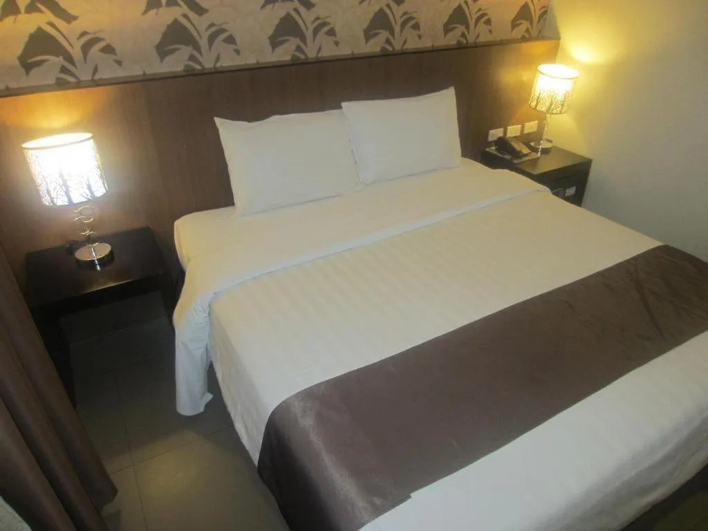 Bed in GT Hotel Bacolod