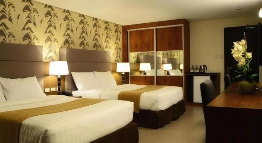 Bed in GT Hotel Bacolod