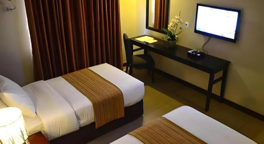 Bed in GT Hotel Bacolod
