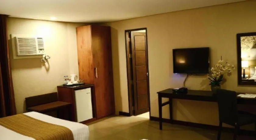 Bed in GT Hotel Bacolod