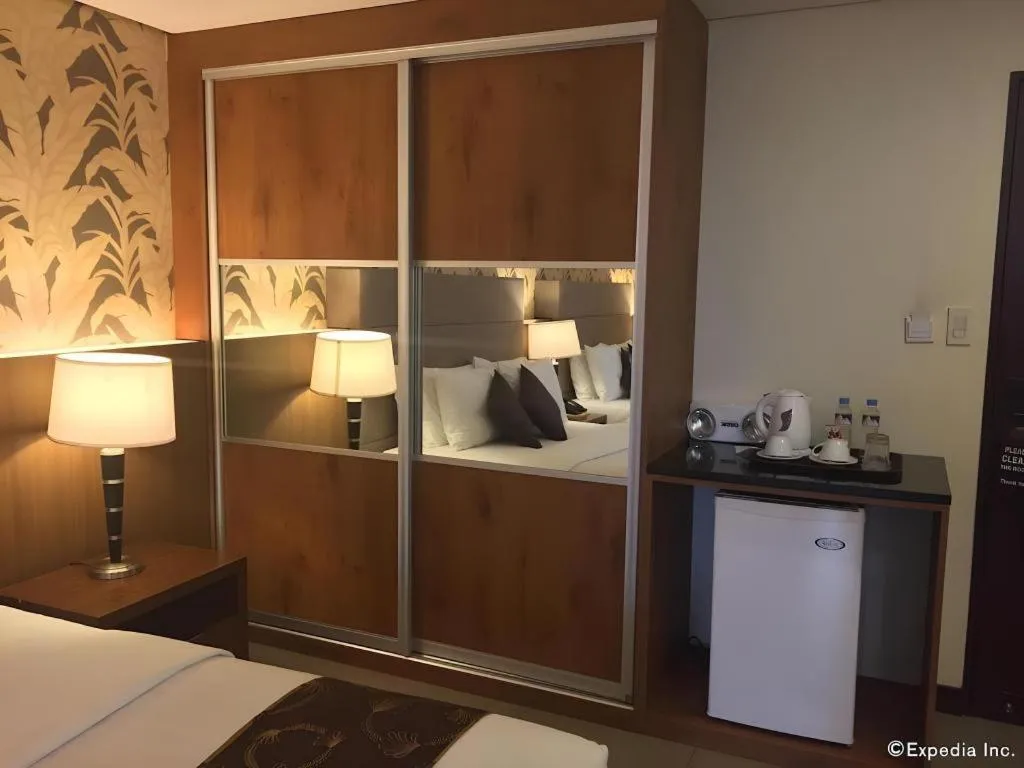 Bed in GT Hotel Bacolod