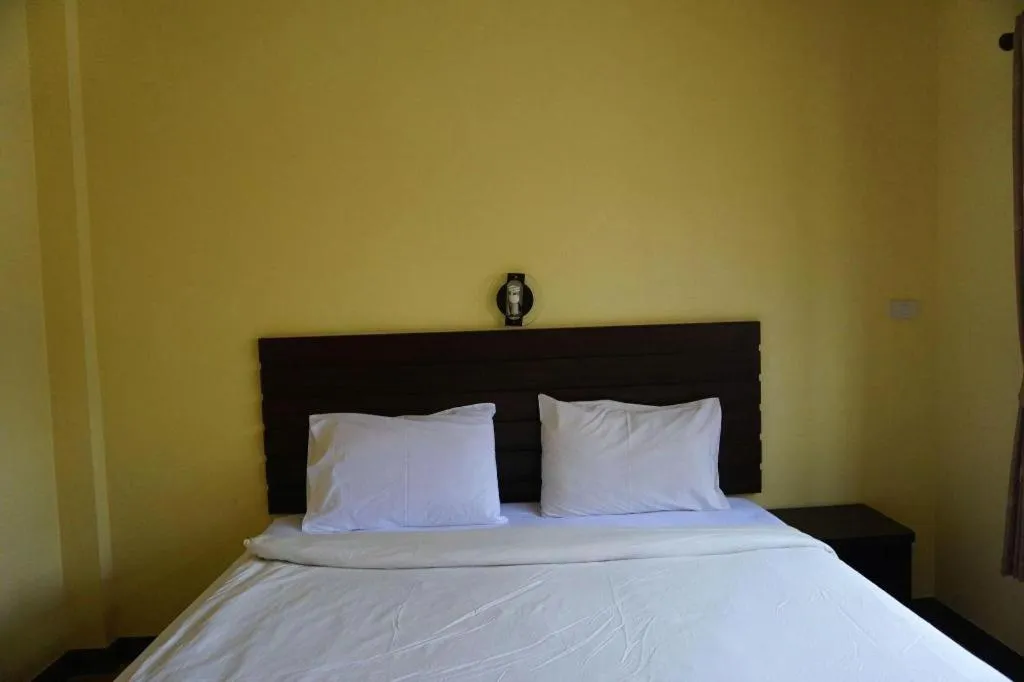 Bed in Ponburi Hotel