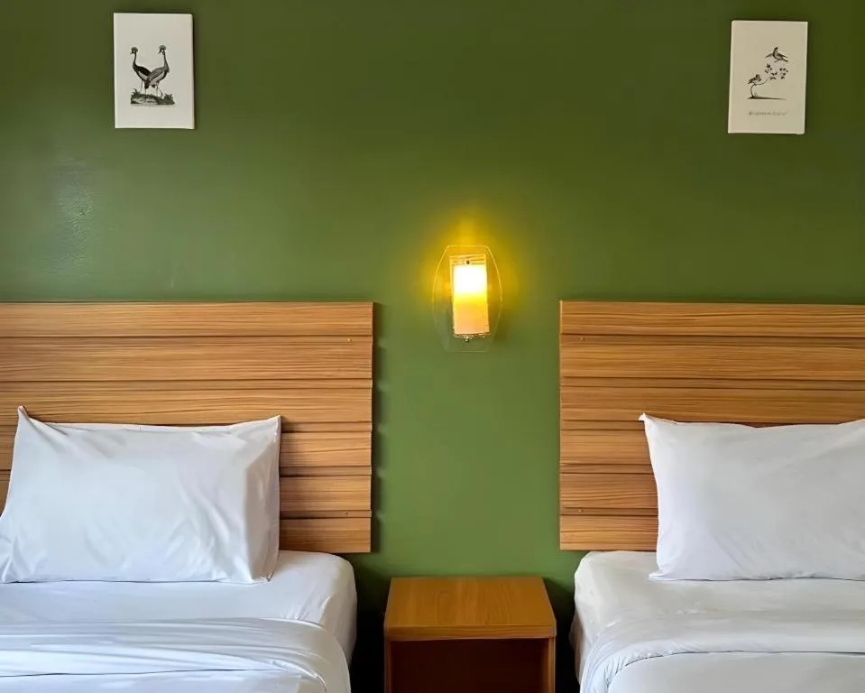 Bed in Ponburi Hotel