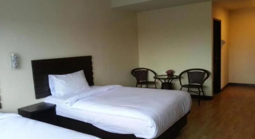 Bed in Ponburi Hotel