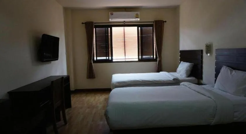Bed in Ponburi Hotel