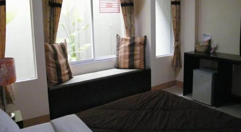 Bed in Winhouse Hotel