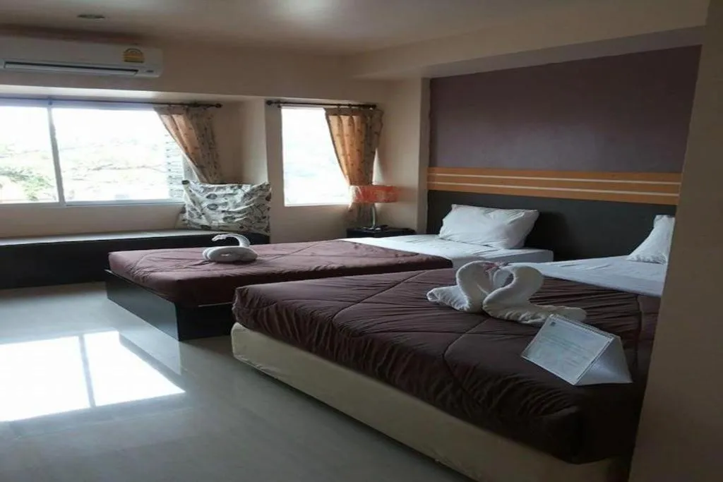 Bed in Winhouse Hotel