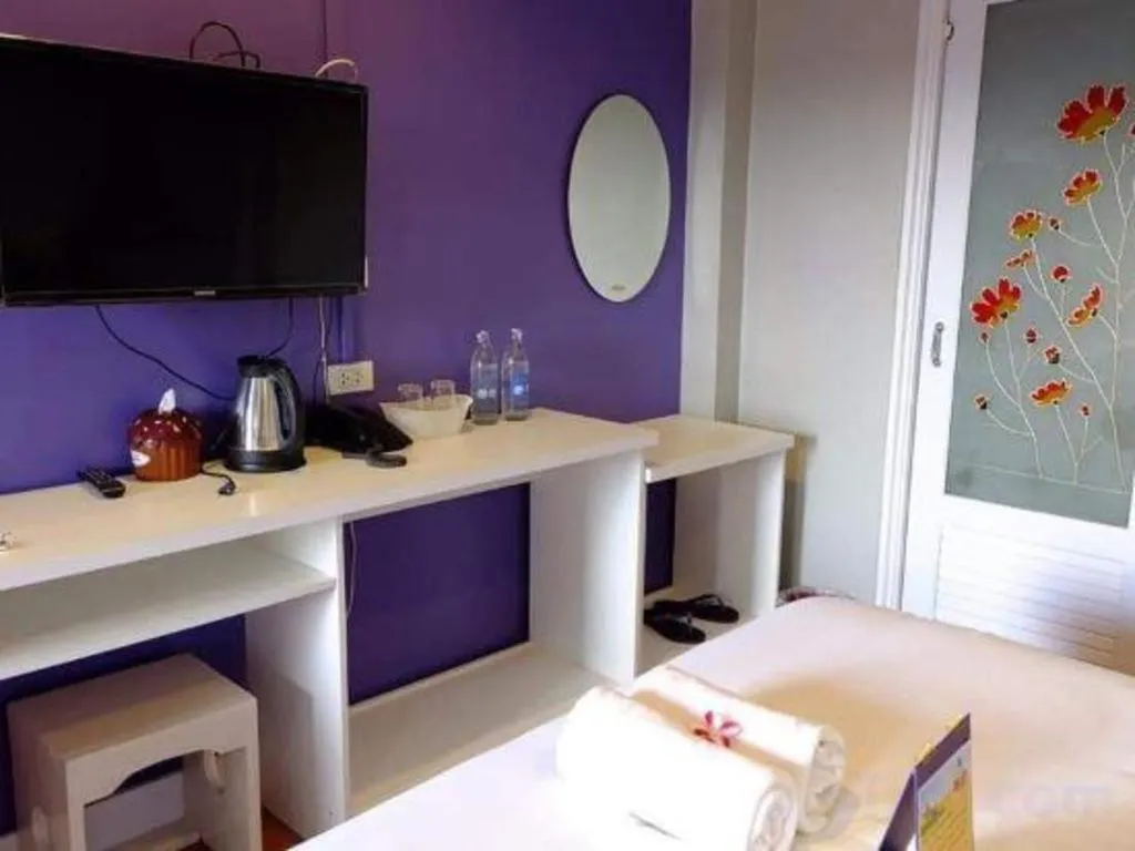 Bed in Winhouse Hotel