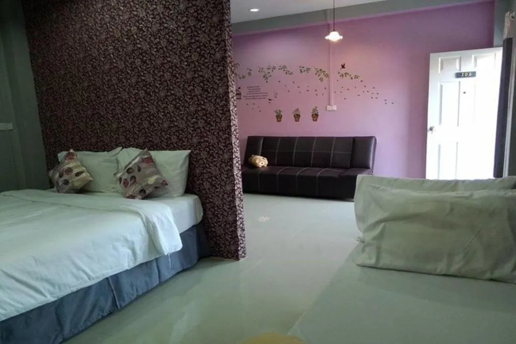 Bed in Winhouse Hotel