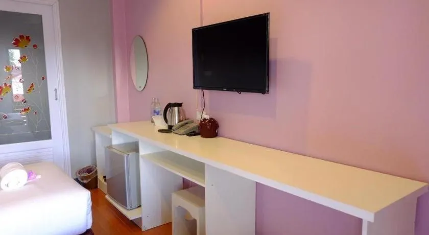 Bed in Winhouse Hotel