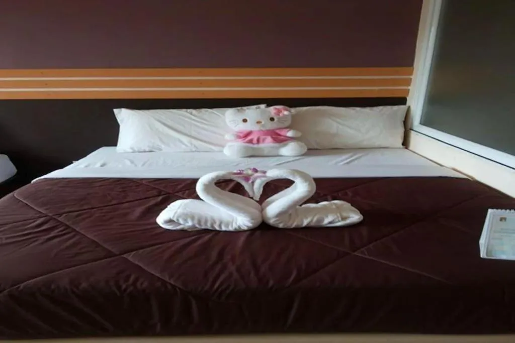 Bed in Winhouse Hotel