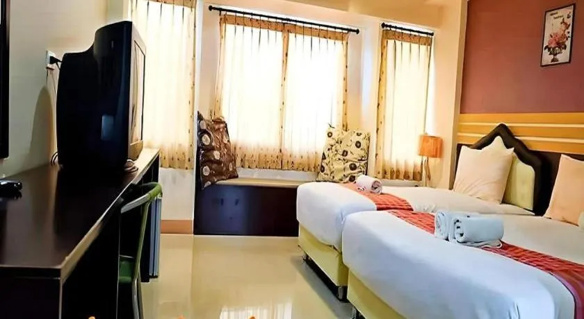 Bed in Winhouse Hotel