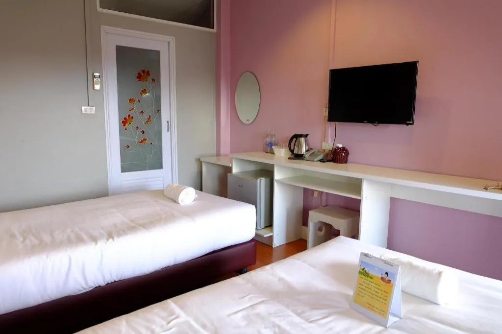 Bed in Winhouse Hotel