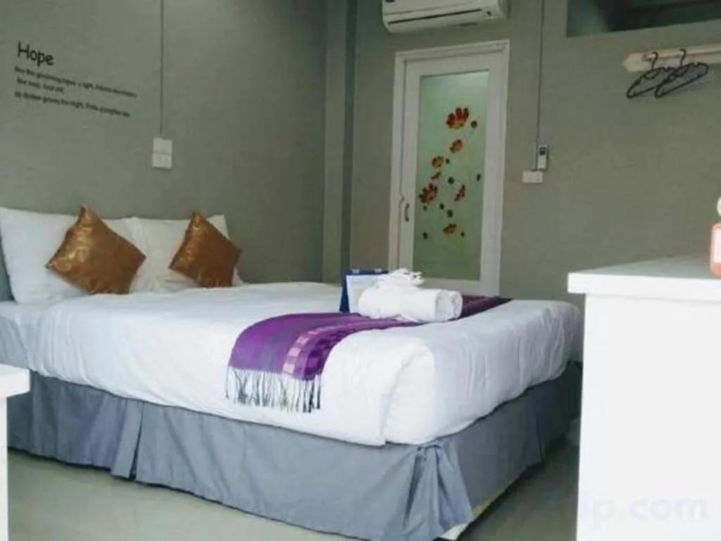 Bed in Winhouse Hotel