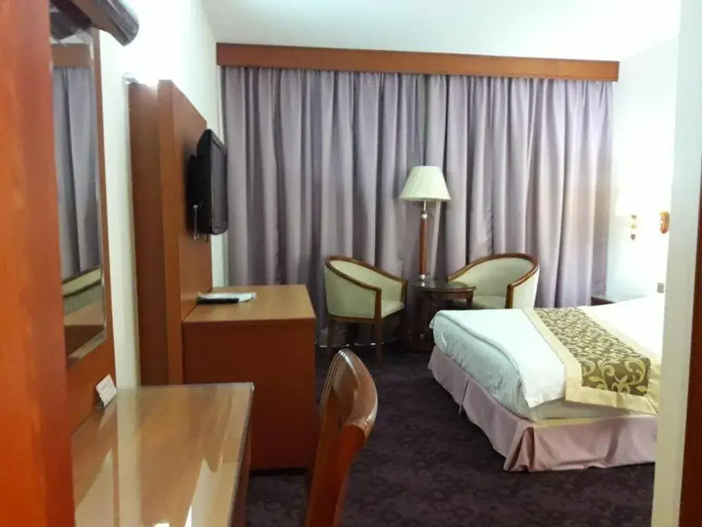 Bed in Kiulap Plaza Hotel Bed in Kiulap Plaza Hotel