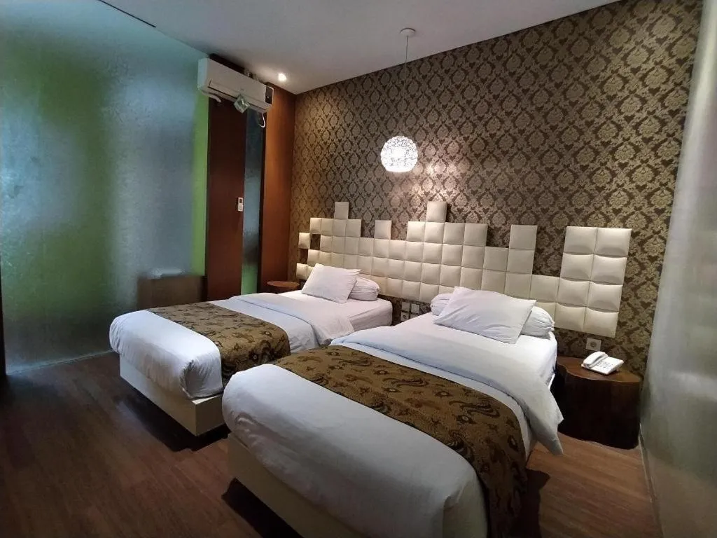 Bed in Griya Jogja Hotel