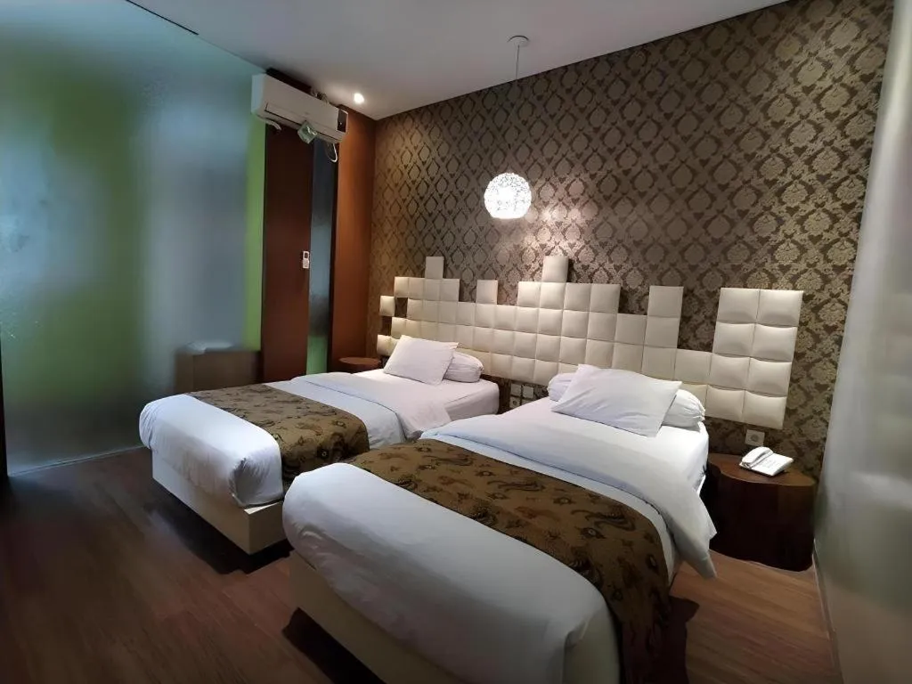 Bed in Griya Jogja Hotel