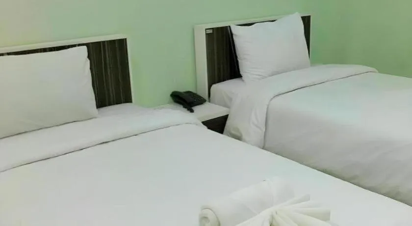 Bed in Chevasai Huahin Hotel