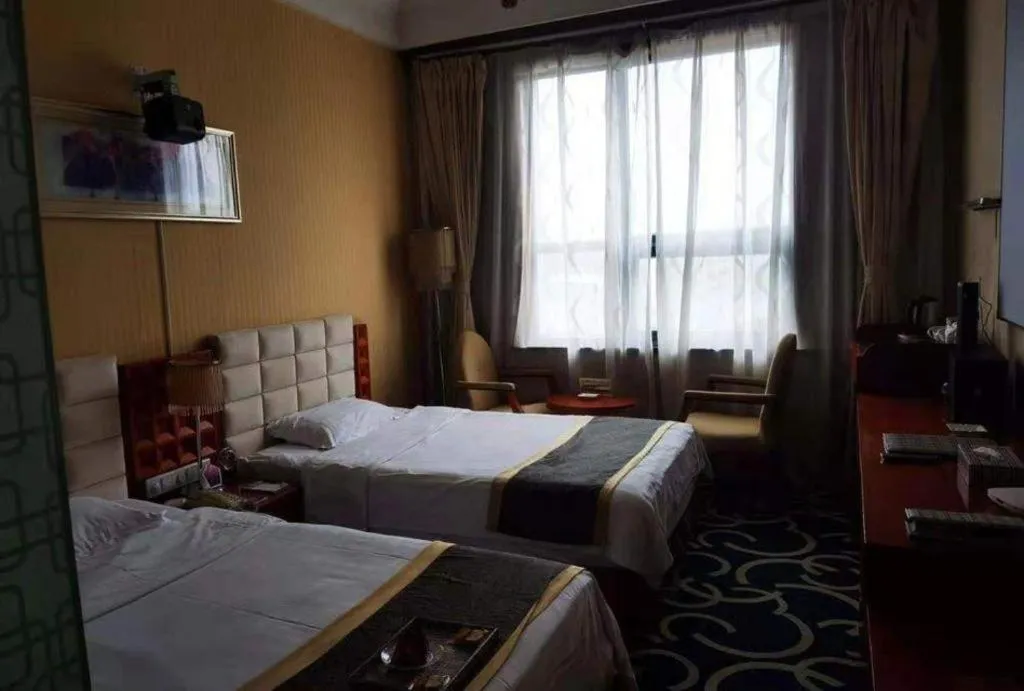 Bed in Pingdingshan Feixing Crowne Plaza Hotel
