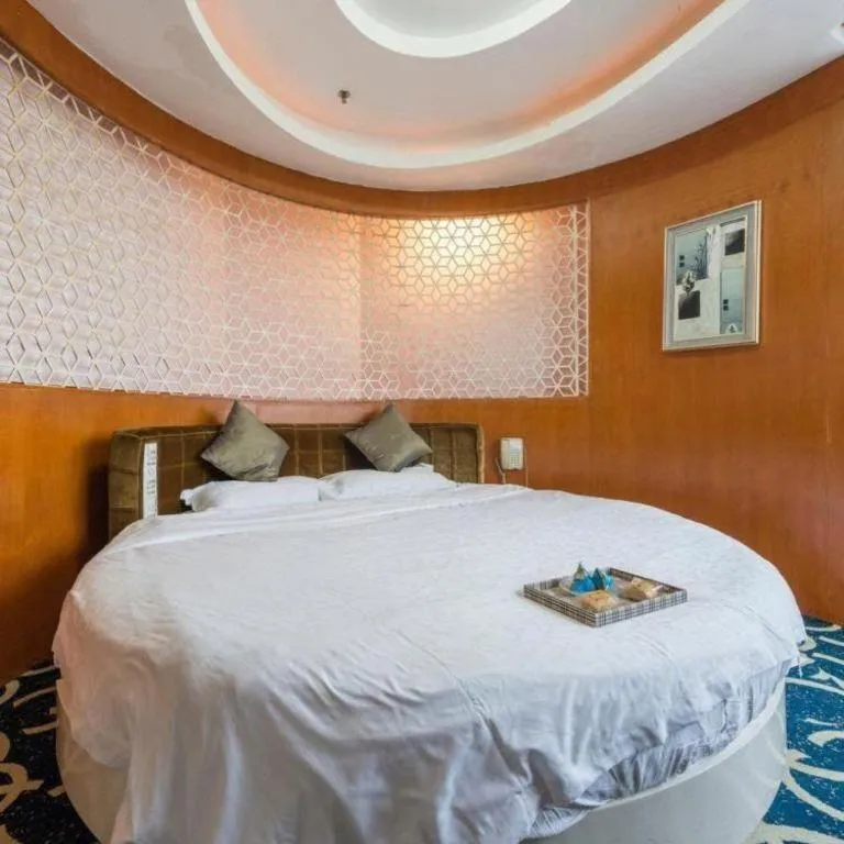 Bed in Pingdingshan Feixing Crowne Plaza Hotel