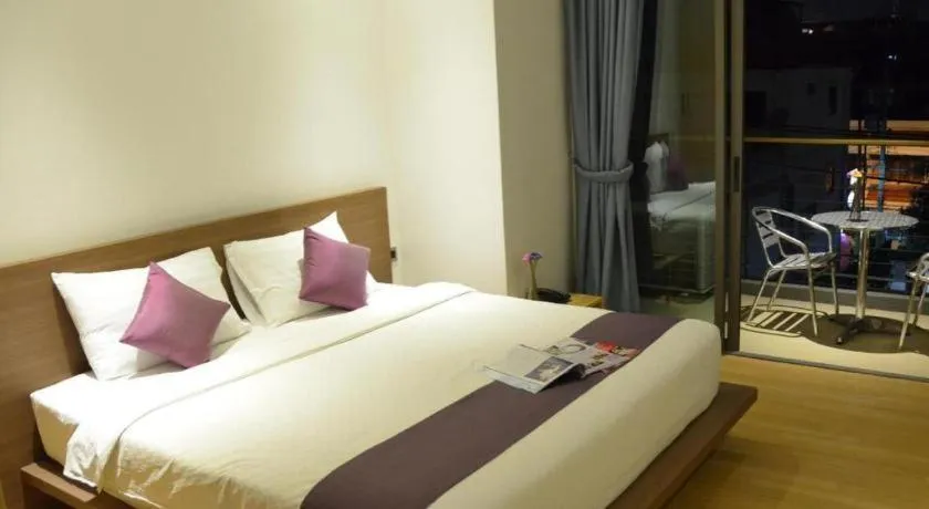 Bed in The Scenery City Hotel