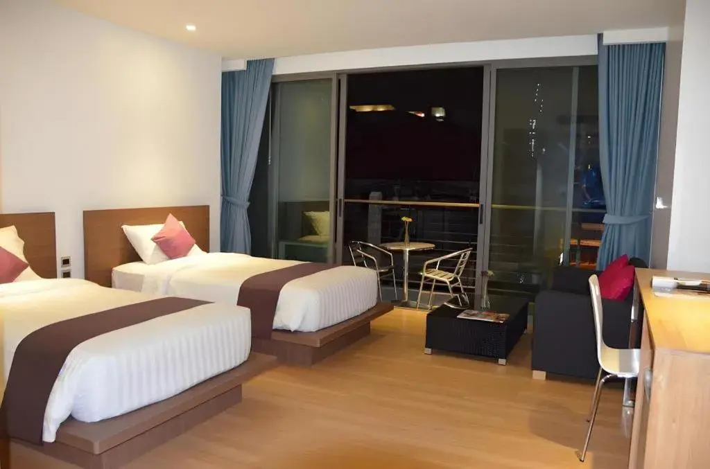 Bed in The Scenery City Hotel Bed in The Scenery City Hotel