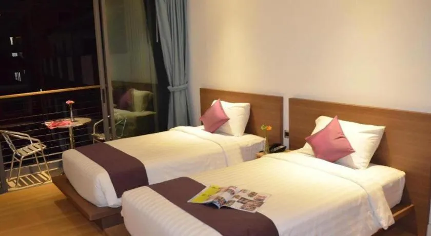 Bed in The Scenery City Hotel