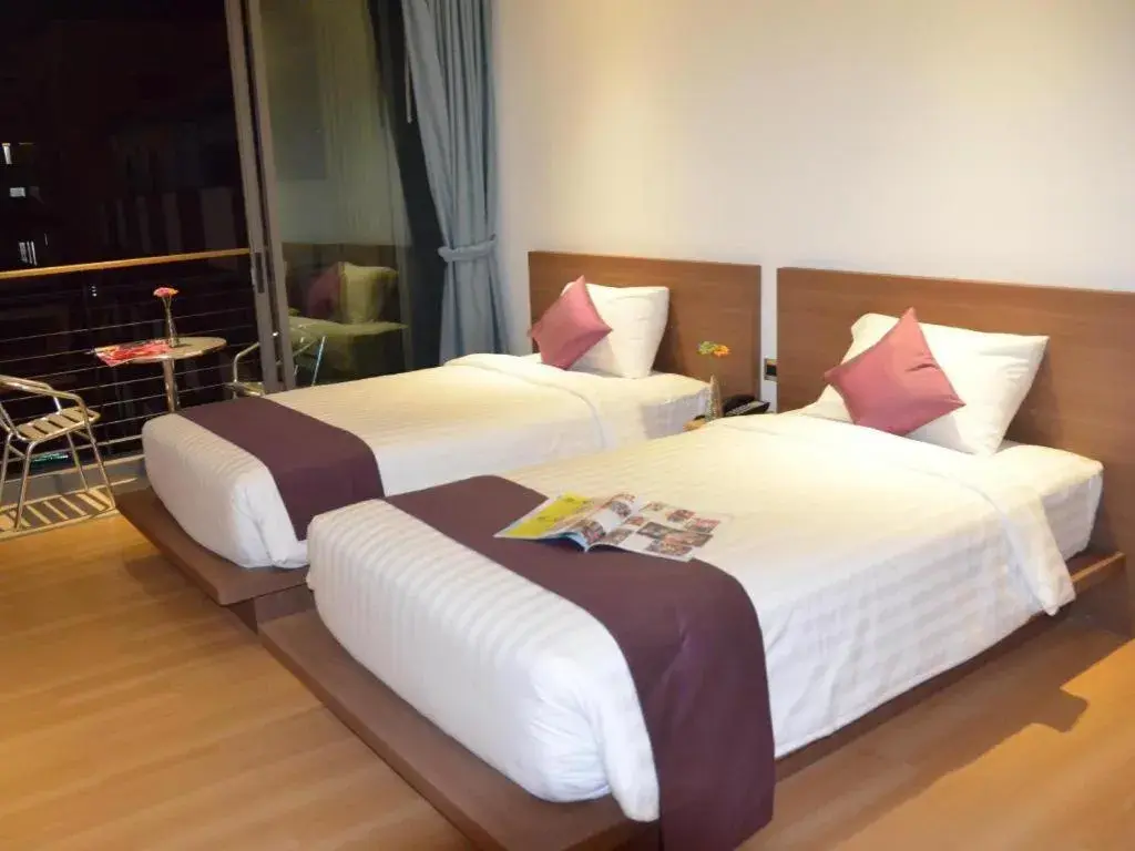 Bed in The Scenery City Hotel Bed in The Scenery City Hotel