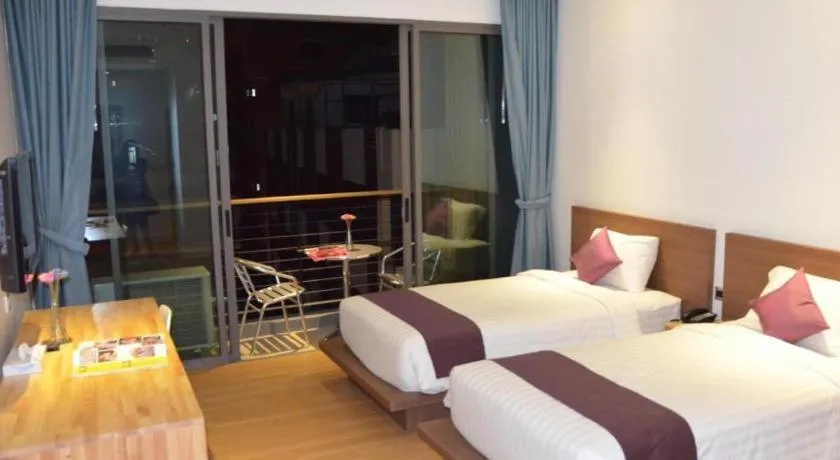 Bed in The Scenery City Hotel