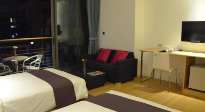 Bed in The Scenery City Hotel