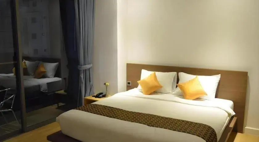 Bed in The Scenery City Hotel Bed in The Scenery City Hotel