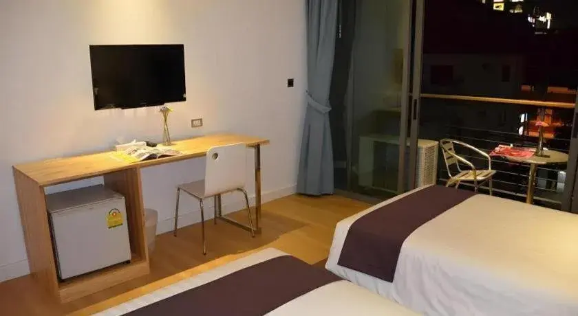 Bed in The Scenery City Hotel Bed in The Scenery City Hotel