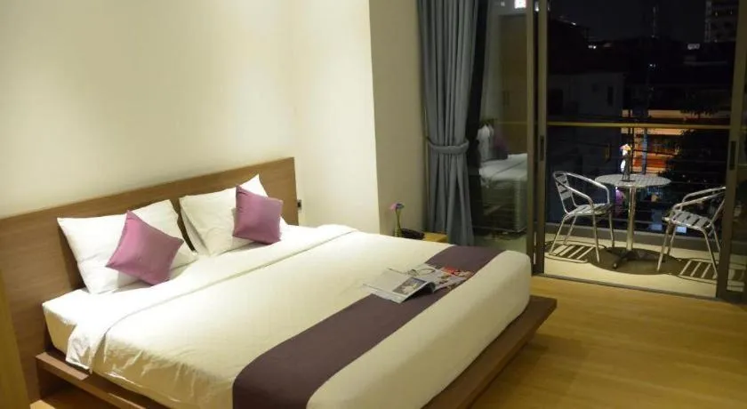 Bed in The Scenery City Hotel