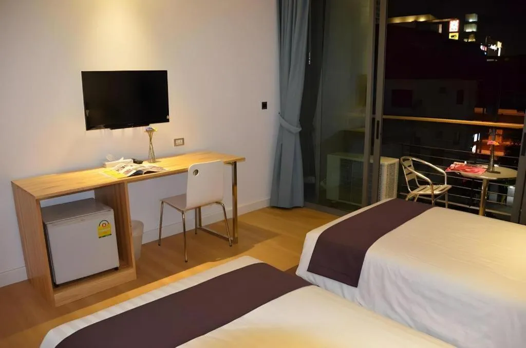 Bed in The Scenery City Hotel