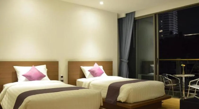 Bed in The Scenery City Hotel