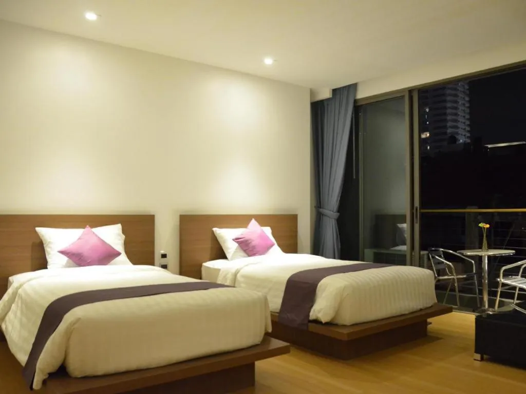 Bed in The Scenery City Hotel